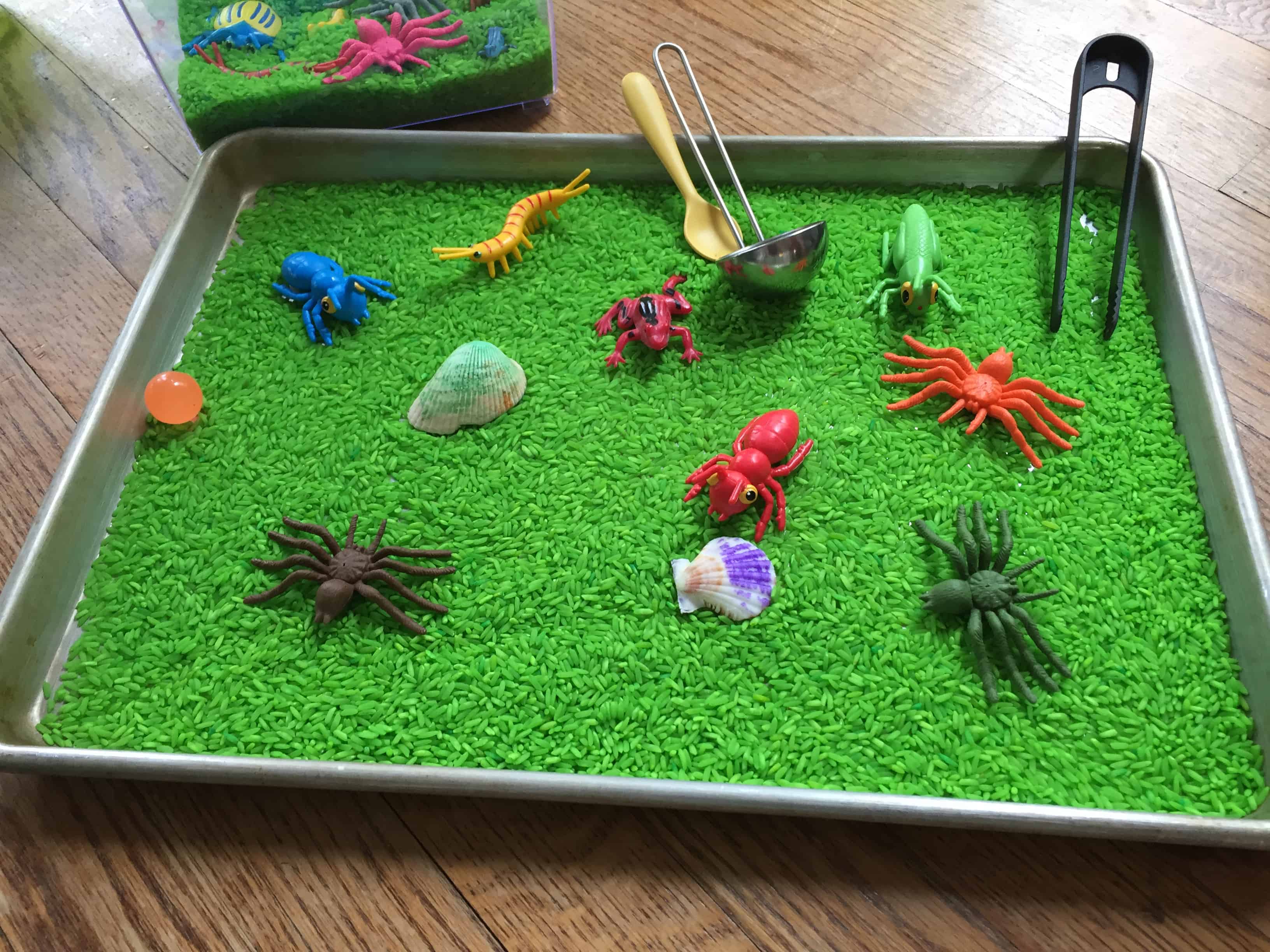 Sensory play green 'grass'. A fun indoor play activity! Made In A Pinch