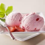 Our homemade strawberry ice cream is more delicious than store-bought versions! Grab our recipe and more at Made in a Pinch and follow us on Pinterest!