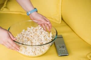 making homemade popcorn in an inexpensive air popper is fast and much healthier than microwave popcorn. Get our recipe and more helpful tips at Made in a Pinch and follow us on Pinterest!-min