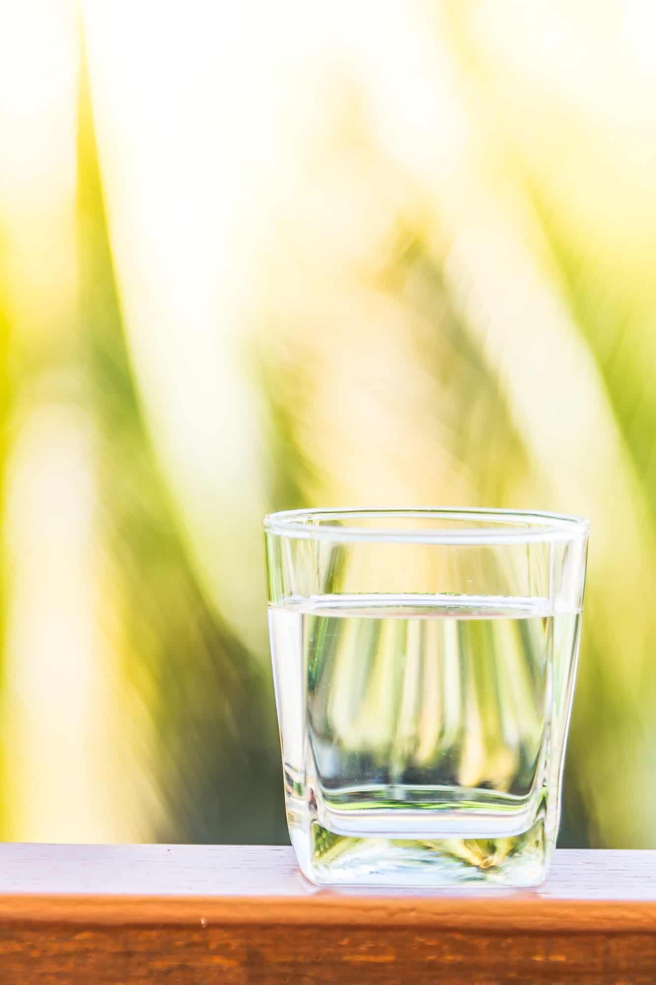 Drink more water daily by keeping a water glass handy