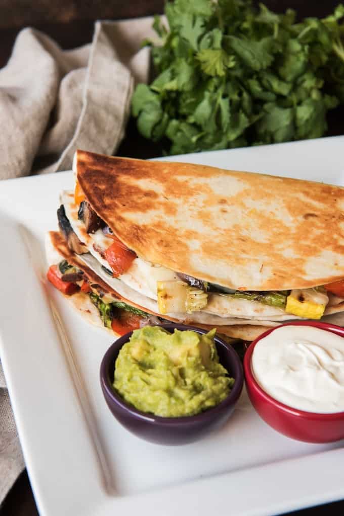 Grilled Summer Vegetable Quesadillas are so easy and healthy. Get the recipe at Made in a Pinch and follow us on Pinterest!