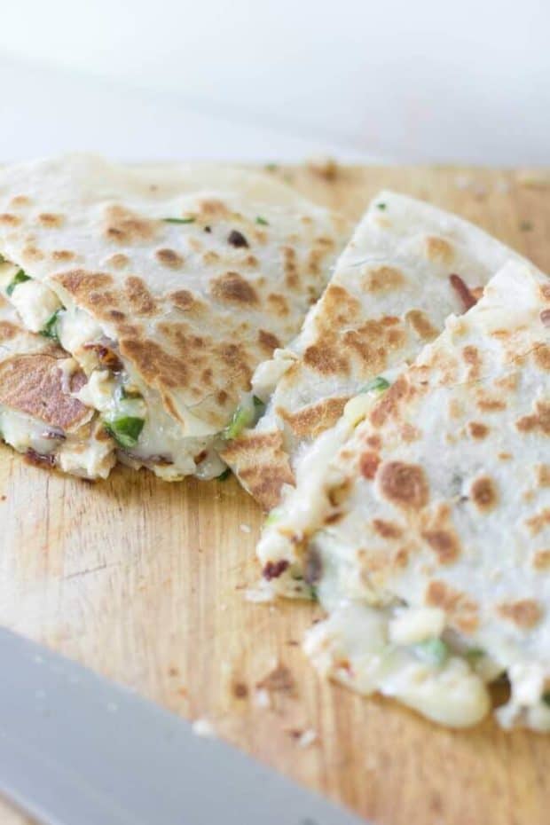 Spinach Artichoke Quesadilla are unique and incredible. Grab this recipe and many more at Made in a Pinch and follow us on Pinterest!