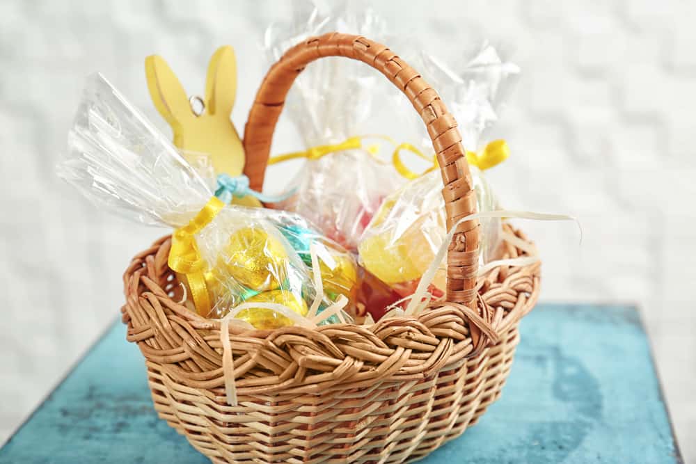 wicker basket filled with Easter basket ideas for toddlers