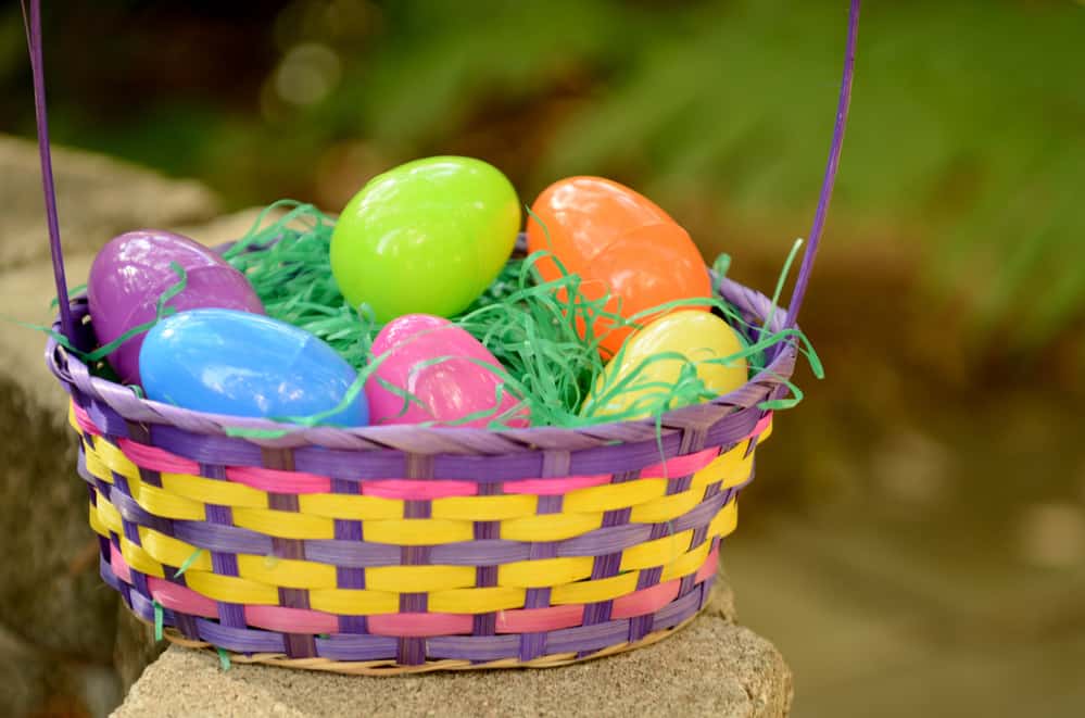 basket with plastic eggs to highlight Easter basket ideas for toddlers