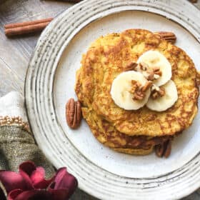 easy gluten-free pancakes topped with banana slices and nuts
