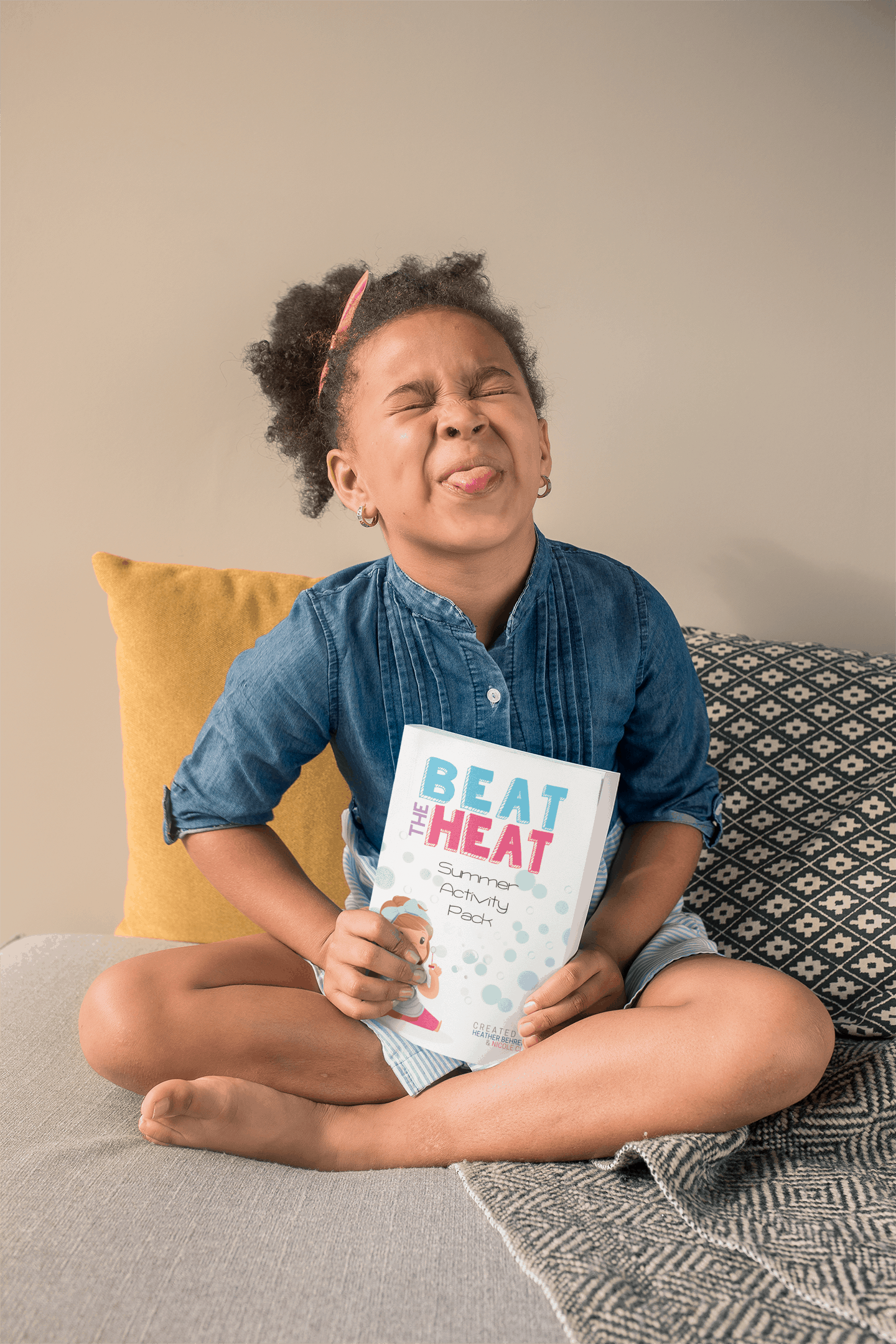 book-mockup-featuring-a-cute-little-girl-sticking-her-tongue-out-23722