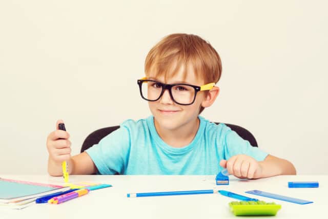 fun educational activities like what this boy with glasses is doing