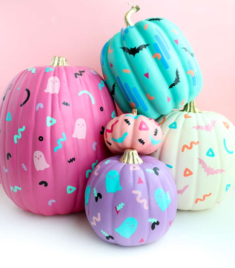 pumpkins decorated with paint and stickers