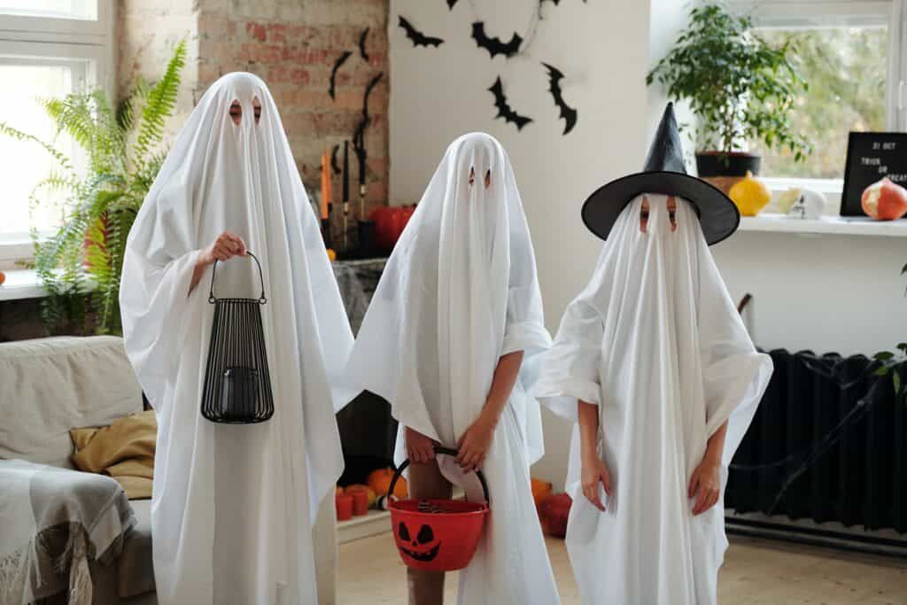 kids dressed as ghosts