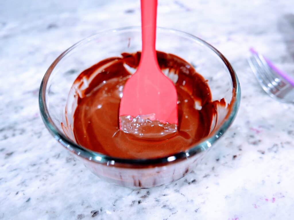 glass bowl with melted chocolate