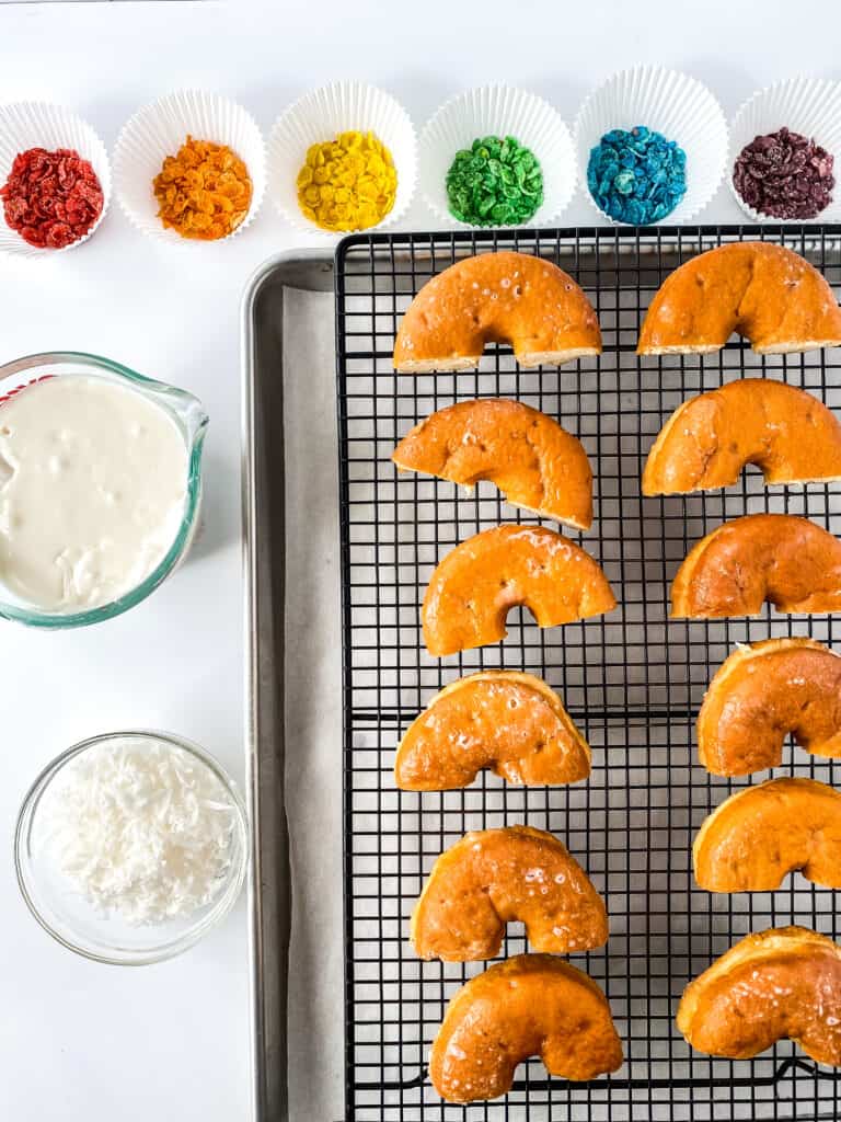Ingredients for Rainbow Donuts! Make these fun donuts with fruity pebbles, white frosting, and coconut! They are SO easy to make that you'll do it again and again to your kids' delight!
