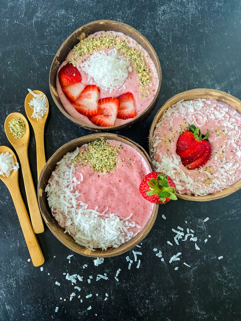 3 smoothie bowls with spoons