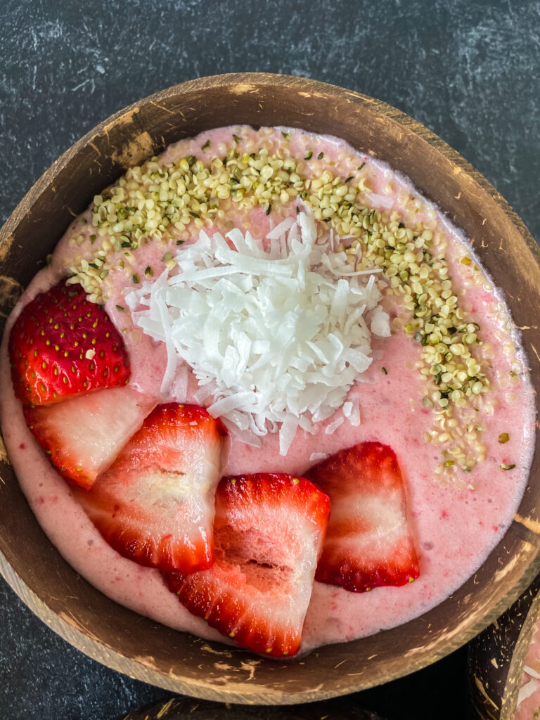 close up of strawberry banana smoothie bowl