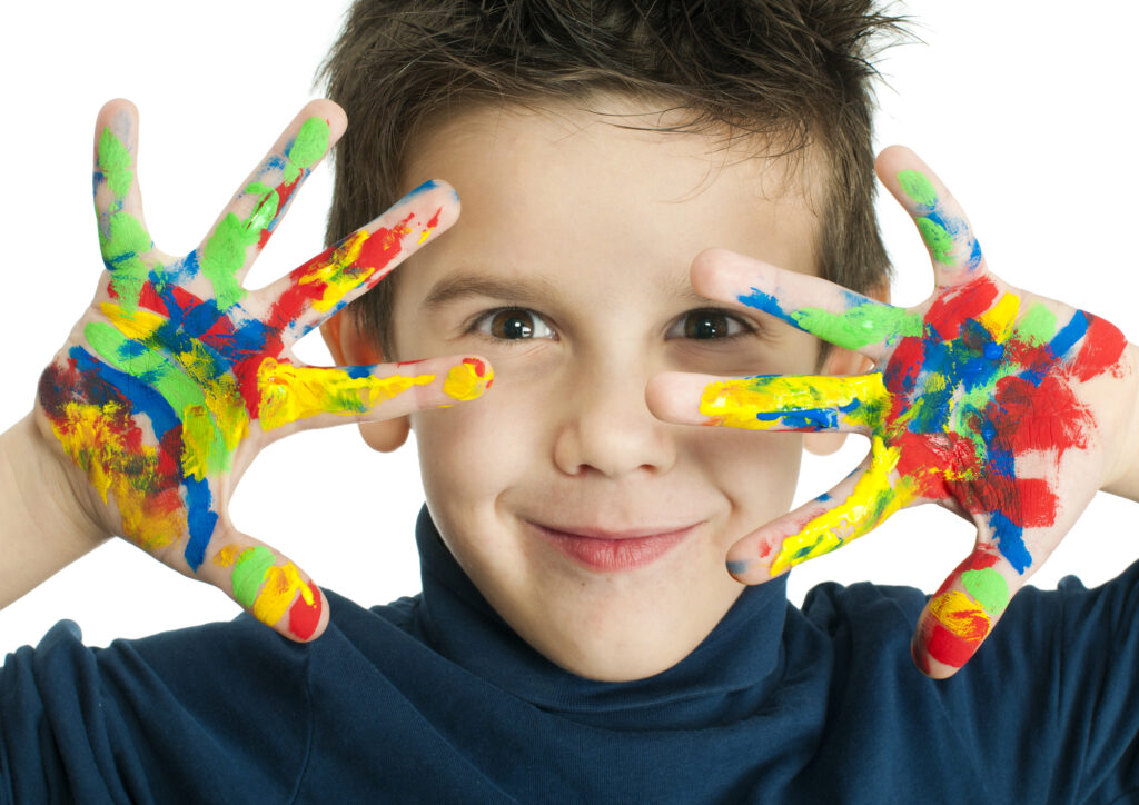 boy with paint on this hands