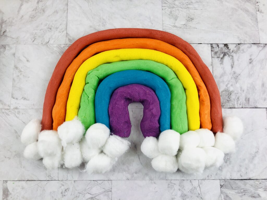 rainbow made out of strips of colored playdough
