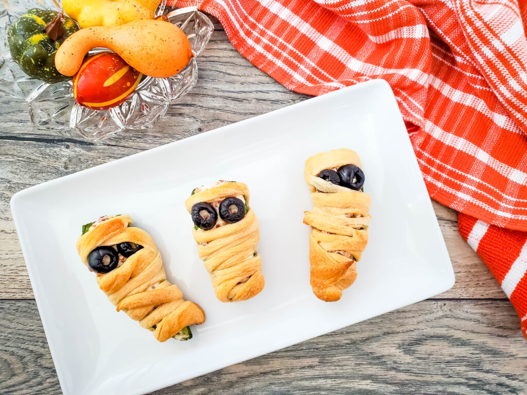 Halloween mummy-wrapped jalapeno poppers