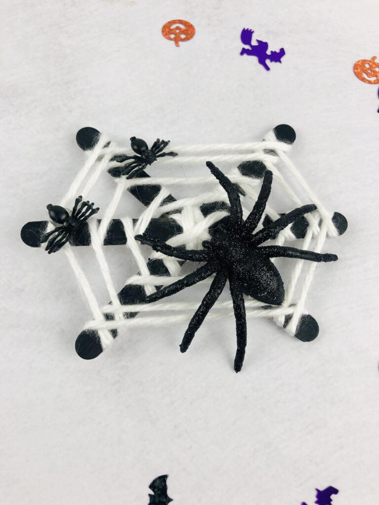 popsicle stick spiderweb craft finished