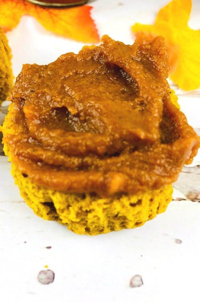 slow cooker pumpkin spread on a muffin