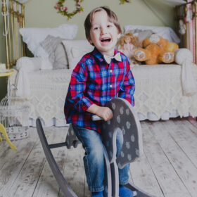toddler on a rocking horse