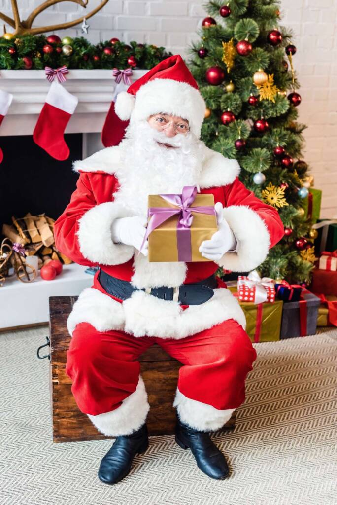 Santa sitting in a chair