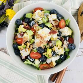 Brunch salad with chicken, veggies, and fruit