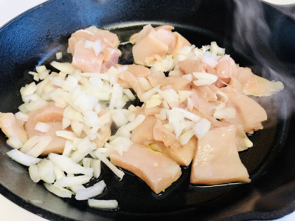 cooking chicken and chopped onions