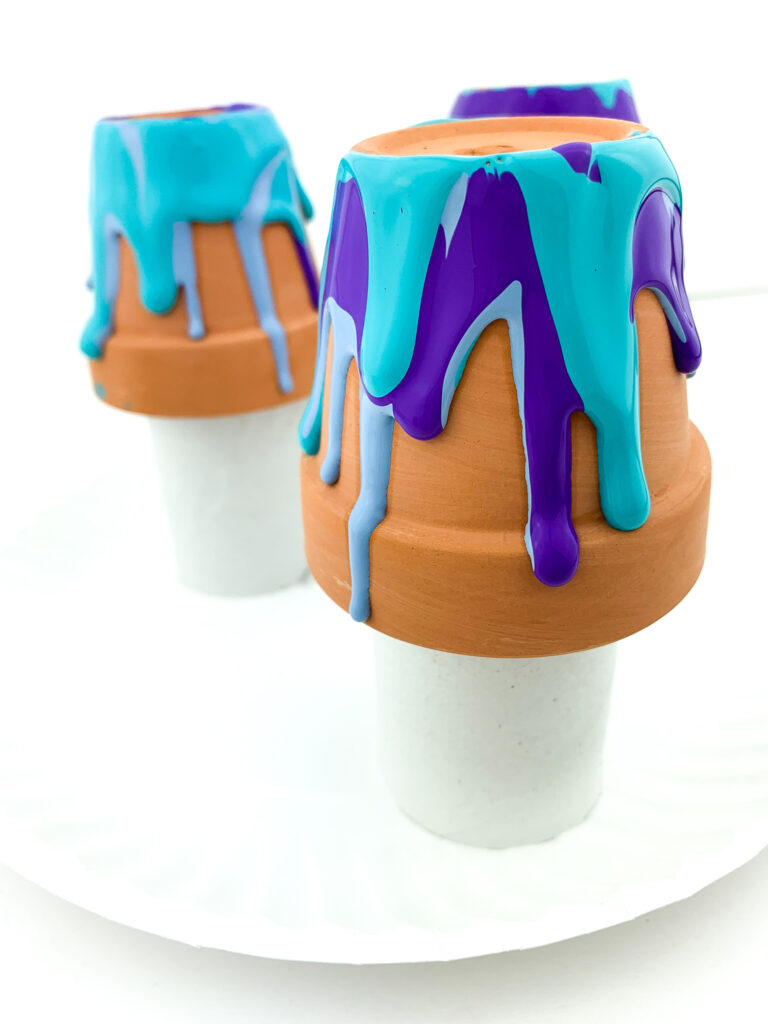 flower pots with drying paint pour