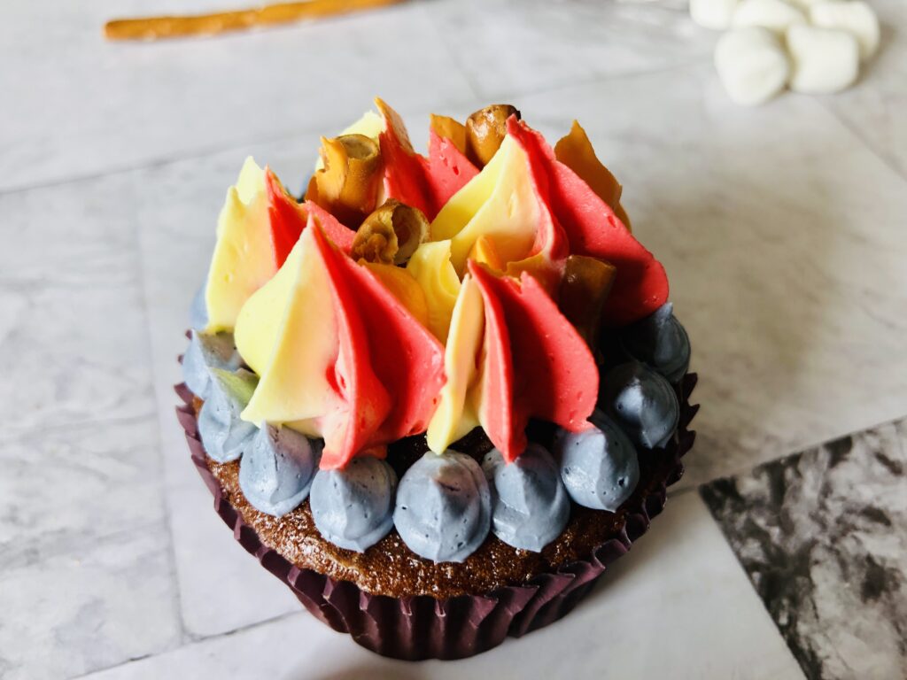piped "flames" frosting on top