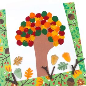Fall handprint tree craft with pom poms