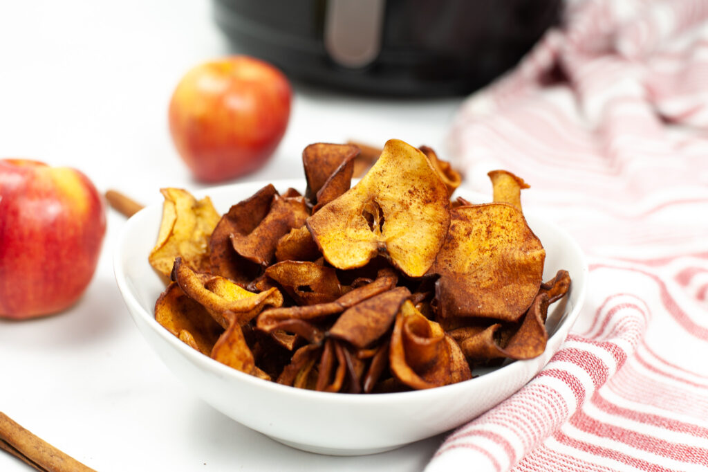 air fryer apple chips in a bowl