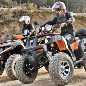 People riding ATVs safely
