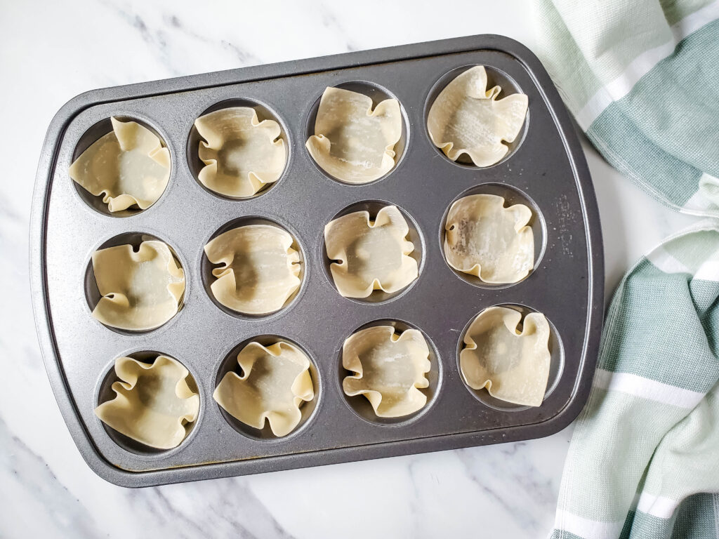 wonton wrappers in muffin tin