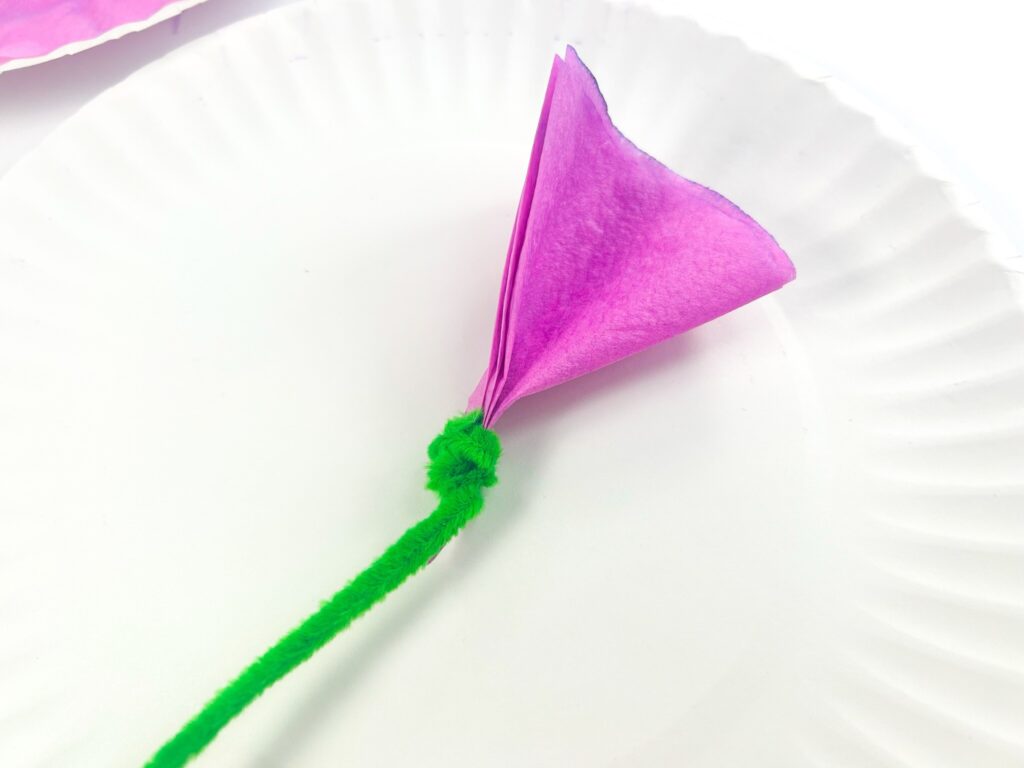 wrapping pipe cleaner around tip of coffee filter