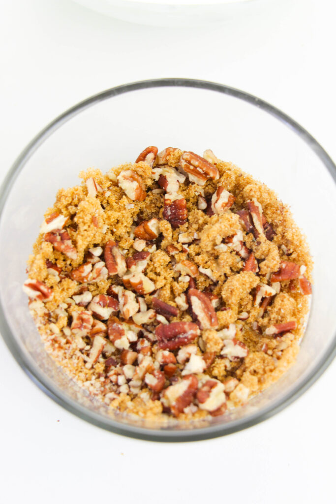 mixing brown sugar and pecans together
