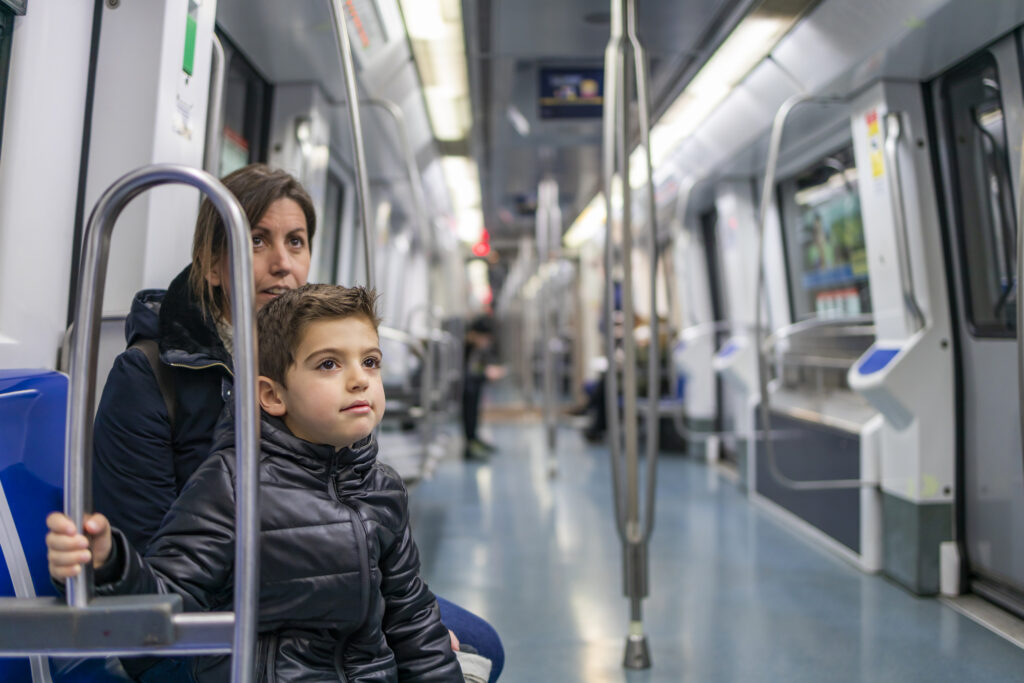 mom and son on subway