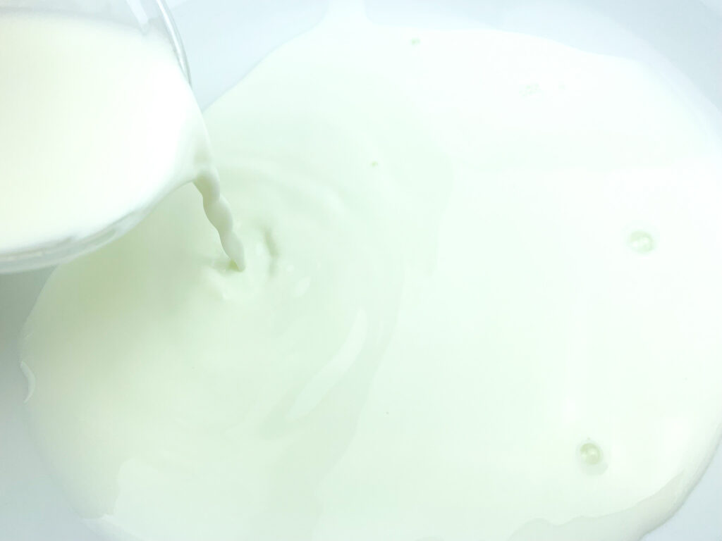 pouring milk onto plate