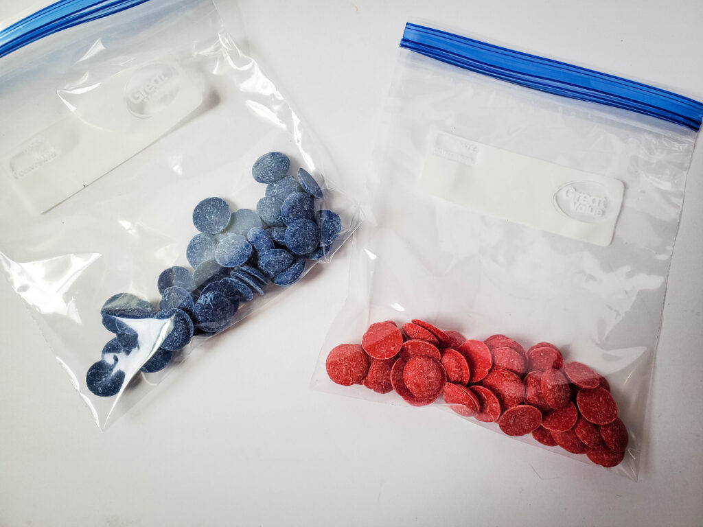 adding colored candy melts to baggies