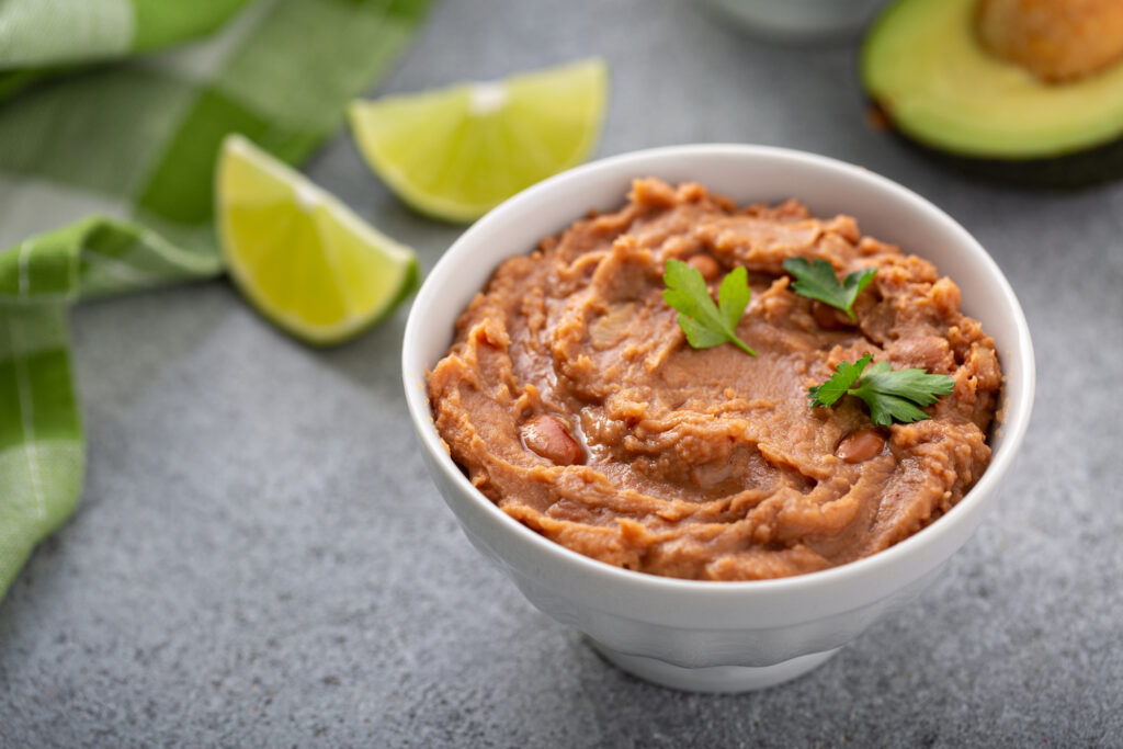 refried beans are a Mexican cuisine staple