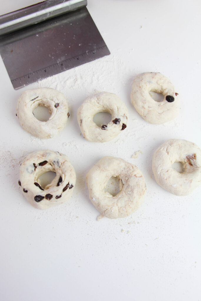 forming dough into bagel shapes