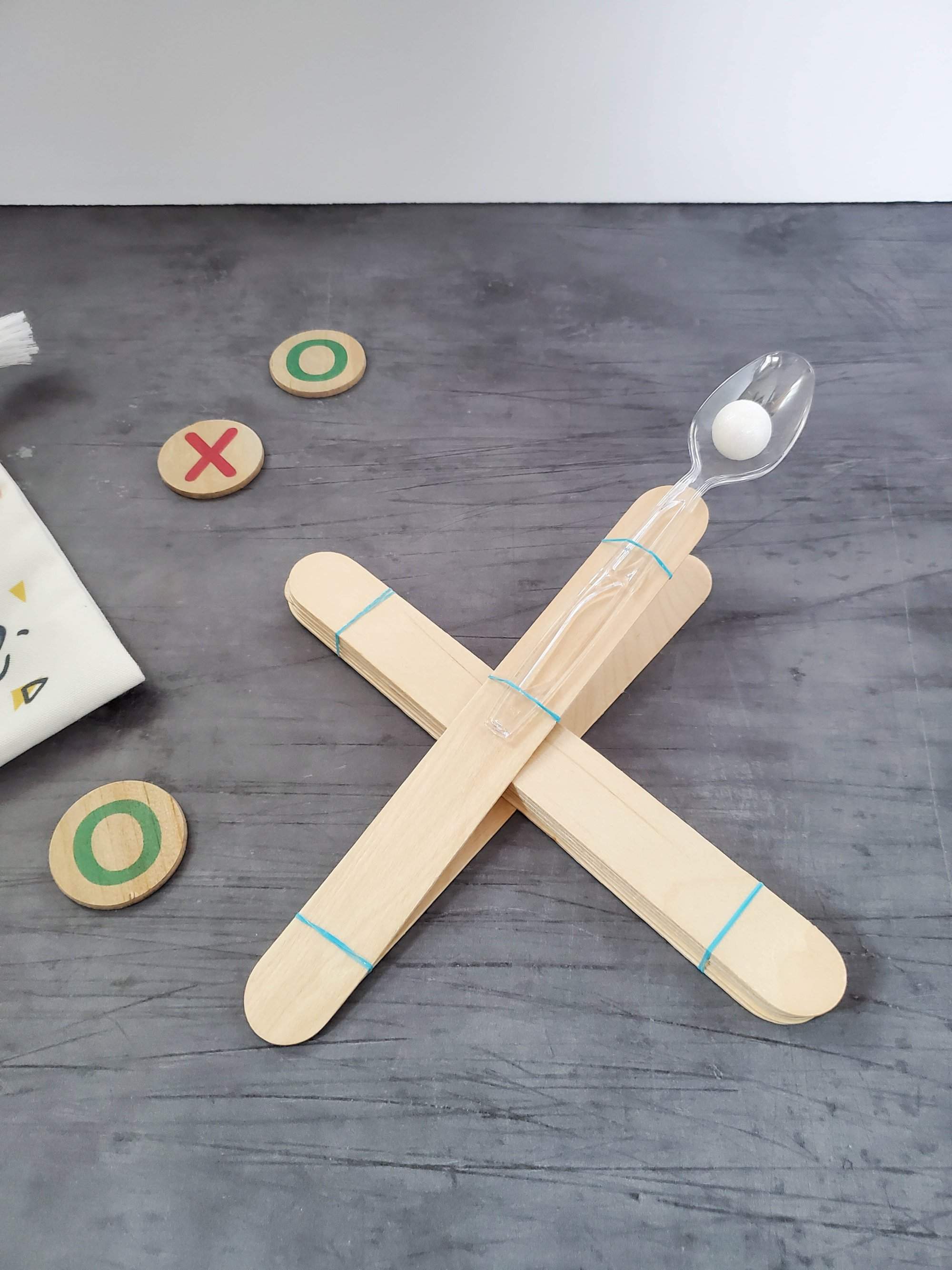 Easy Popsicle Stick Catapult Activity for Kids (STEM!) - Made In A Pinch