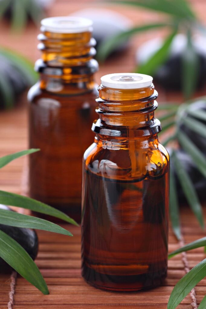 closeup of two bottles of essential oils